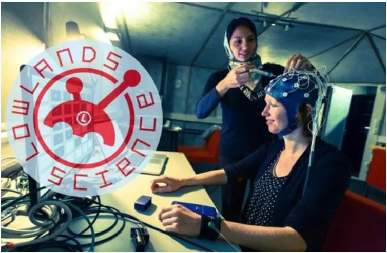 A participant wearing an EEG cap at a Lowlands Science lab